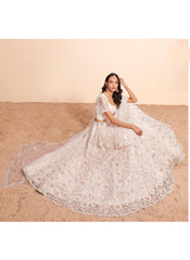 Off White Heavy Embroidered Net Lehenga Choli