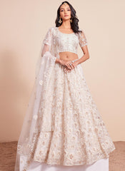 Off White Heavy Embroidered Net Lehenga Choli