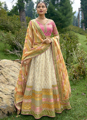 Off White , Pink and Yellow Embroidered Silk Lehenga Choli