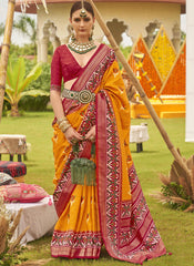 Woven Mustard Yellow And Maroon Patola Print Silk Saree